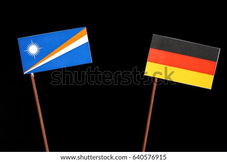 Marshall Islands flag with German flag isolated on black background