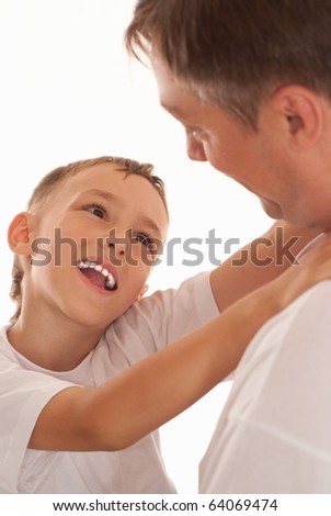 happy father and son on a white background