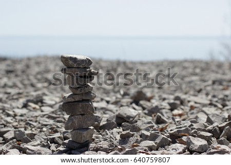 the stone gravels stacked on top of each other to make a background. the riprap of crushed stone on the bank of the Volga River.