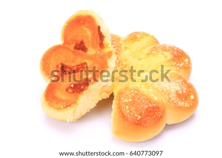  sweet bun with almond and dried grape is on the white background