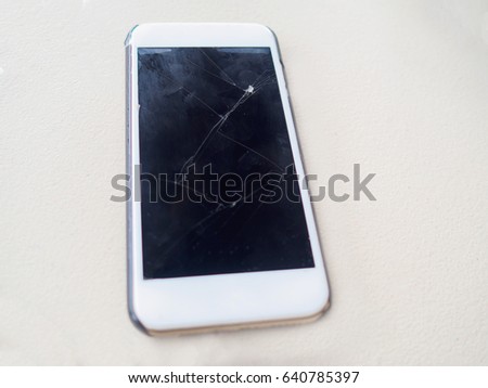 Smart phone with broken, cracked, screen, on white background. Concept for claim and warranty service.