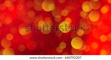 Abstract sparkling bokeh blurred of colorful party lights in the background.