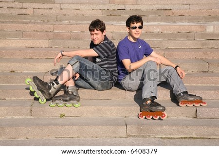 two rollers sit on the stairs