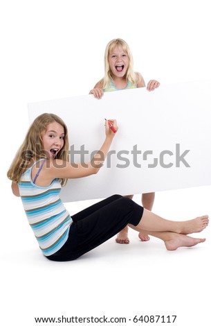 two blond girls with a blank display board, isolated on white background