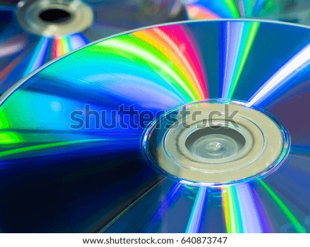 close up Compact discs background with rainbow reflection and Abstract spectrum color