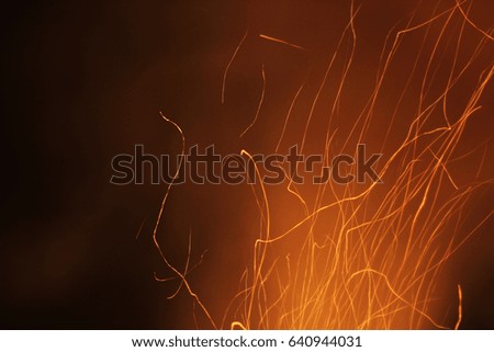 Sparks on a black background. Sparks of fire. Fire. 