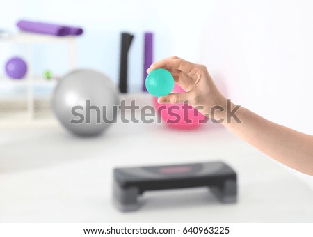 Hand of woman with stress ball in clinic