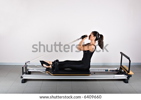 Bicep reformer position. Pilates gymnastics is a Germanic evolution of yoga, used by athletes to improve flexibility and body fitness and by chiropractors for patient recovery.