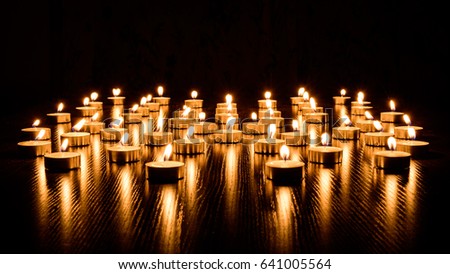 Group of burning candles with shallow depth of field