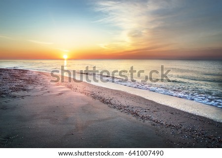 Summer sunrise on the seashore