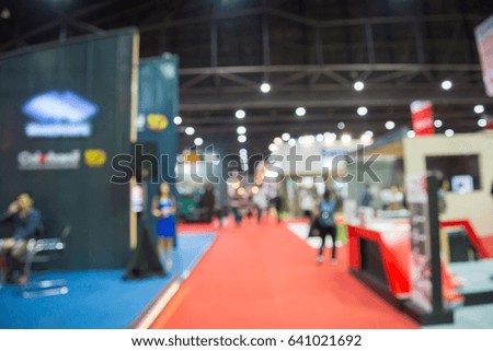 Abstract blur people in exhibition hall event trade show background