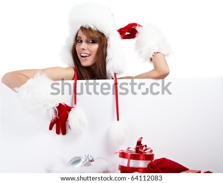 Beautiful christmas woman in santa hat holding empty board