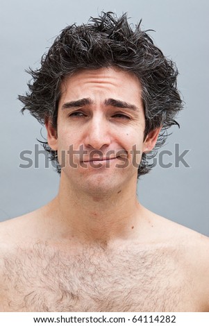 Young guy with crazy looking facial expression