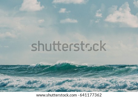 Ocean Waves Crashing Royalty-Free Stock Photo #641177362
