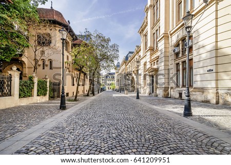 The beautiful Strada Postei street in the Lipscani district, in a moment of tranquility without people, historical center of Bucharest, Romania Royalty-Free Stock Photo #641209951