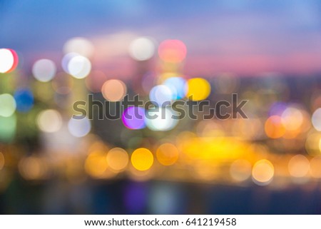 Singapore city Skyline at Night on Sand Sky Park. Blurred Photo bokeh