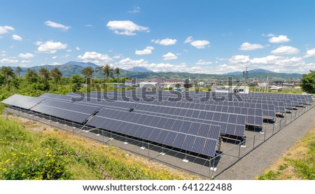solar panels , solar  power plant  innovation green energy for life with beautiful mountains and blue sky background,Obuse Town,Nagano,Japan.