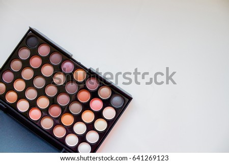 Female palette for eye shadows with different colors
 Royalty-Free Stock Photo #641269123