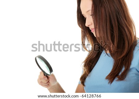 The woman with a magnifier in a hand on the isolated background