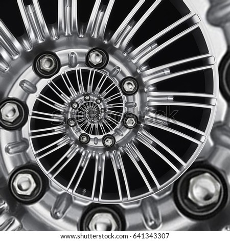Car automobile wheel rim spiral abstract metallic fractal background. Silver hex nuts, wheel spokes spiral effect pattern background illustration. Automotive abstract wheel. Truck chrome wheel rim