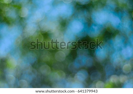 Abstract and blurred green backdrop. Natural background