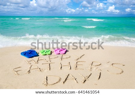 Happy father's day background with flip flops on the Miami sandy beach near the ocean, Florida