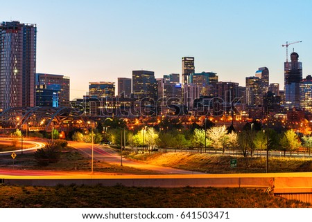 A photo of the Denver Skyline taken during the early morning sunrise.