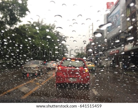 Rain on car front window