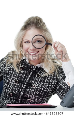 Young business women with magnifying glasses; searching for business solutions concept; isolated on white background