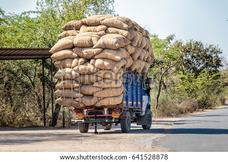 Indian cargo truck overloaded near udaipur, India. Royalty-Free Stock Photo #641528878