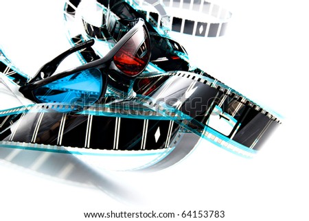Anachrome plastic 3D imaging glasses on film strip, 3-d experience Royalty-Free Stock Photo #64153783