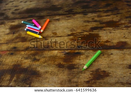 colorful colour pencil over wooden table background