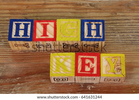 The term high key visually displayed using colorful wooden blocks