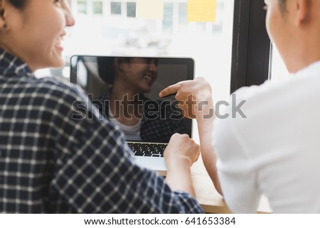 young college student sitting in room smiling, talking in cafe coffee shop, start up business people meeting and using laptop in co working space