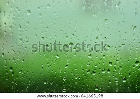 Raindrops stuck on glass windows
