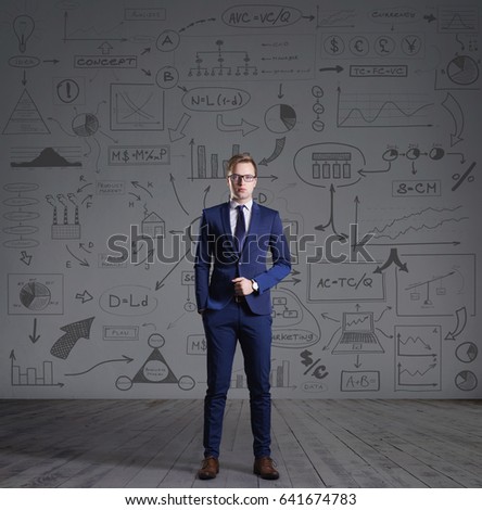 Businessman standing on a schematic background. Business and office, concept.