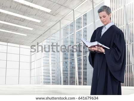 Digital composite of Judge holding book in front of large windows in city
