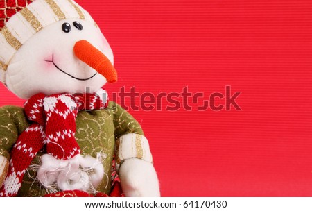 Snowman on red background, space to insert text or design