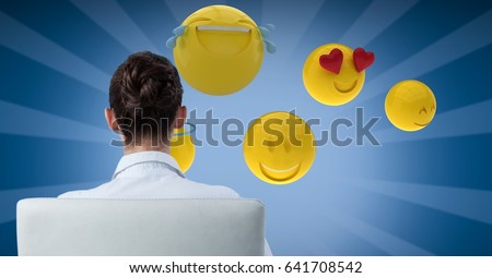 Digital composite of Digital composite image of businesswoman looking at emojis