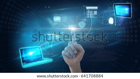 Digital composite of Digital composite image of hand touching futuristic screen