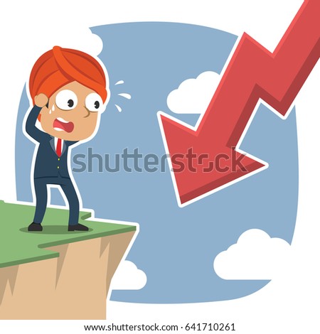 indian businessman shock see downward arrow from cliff edge