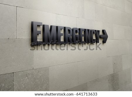 A building signage that says 'Emergency'.