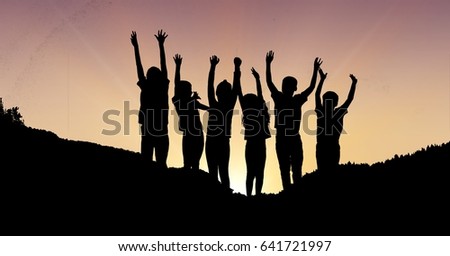 Digital composite of Silhouette children with hands raised on mountain during sunset