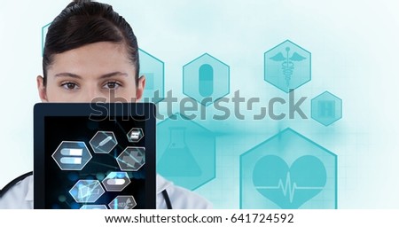 Digital composite of Digital composite image of doctor showing medical signs on tablet PC