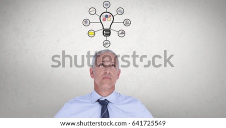 Digital composite of Digital composite image of businessman with light bulb graphics