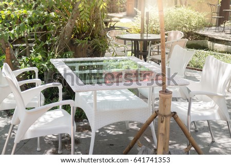 Outdoor Table And Chair In Garden, stock photo