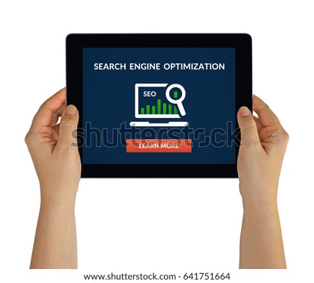 Hands holding digital tablet computer with search engine optimization (SEO) concept on screen. Isolated on white. All screen content is designed by me