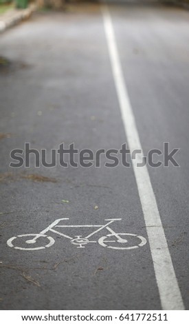 Symbol to indicate the road for bicycles.please share the road for bike.white bicycle road sign.traffic way  symbol or sign on a bicycle.