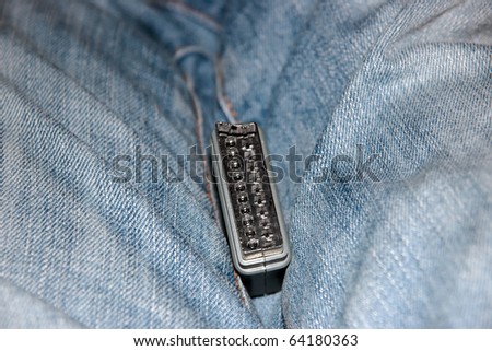 scart socket between a pair of jeans
