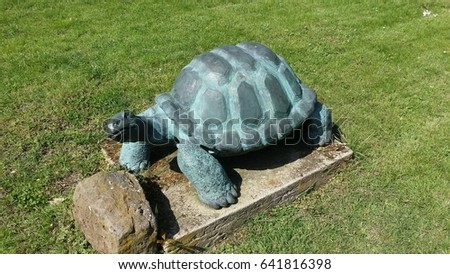turtle statue on grass